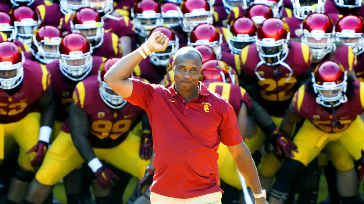 Lynn Swann prepares to lead the USC football team onto the field at the Coliseum for a game in 2014.