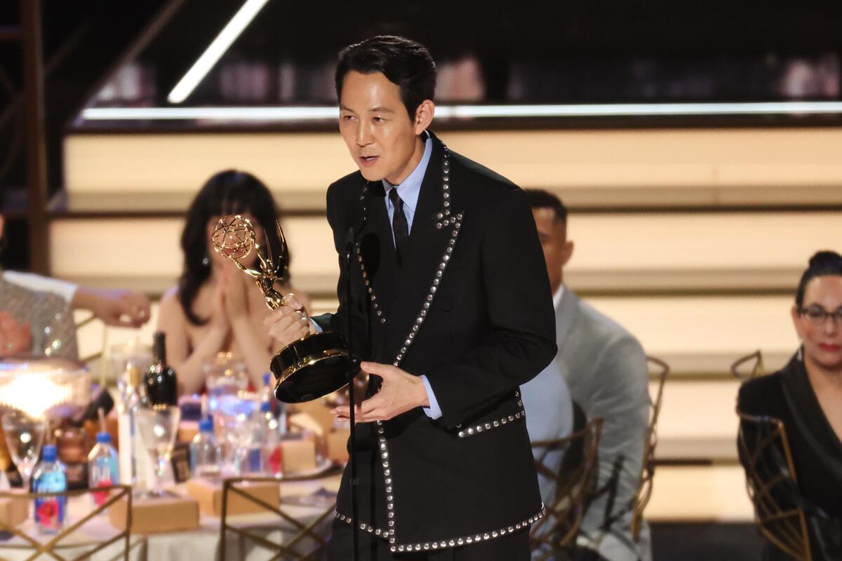 Lee Jung-jae accepts the Emmy for lead actor in a drama series, for "Squid Game."