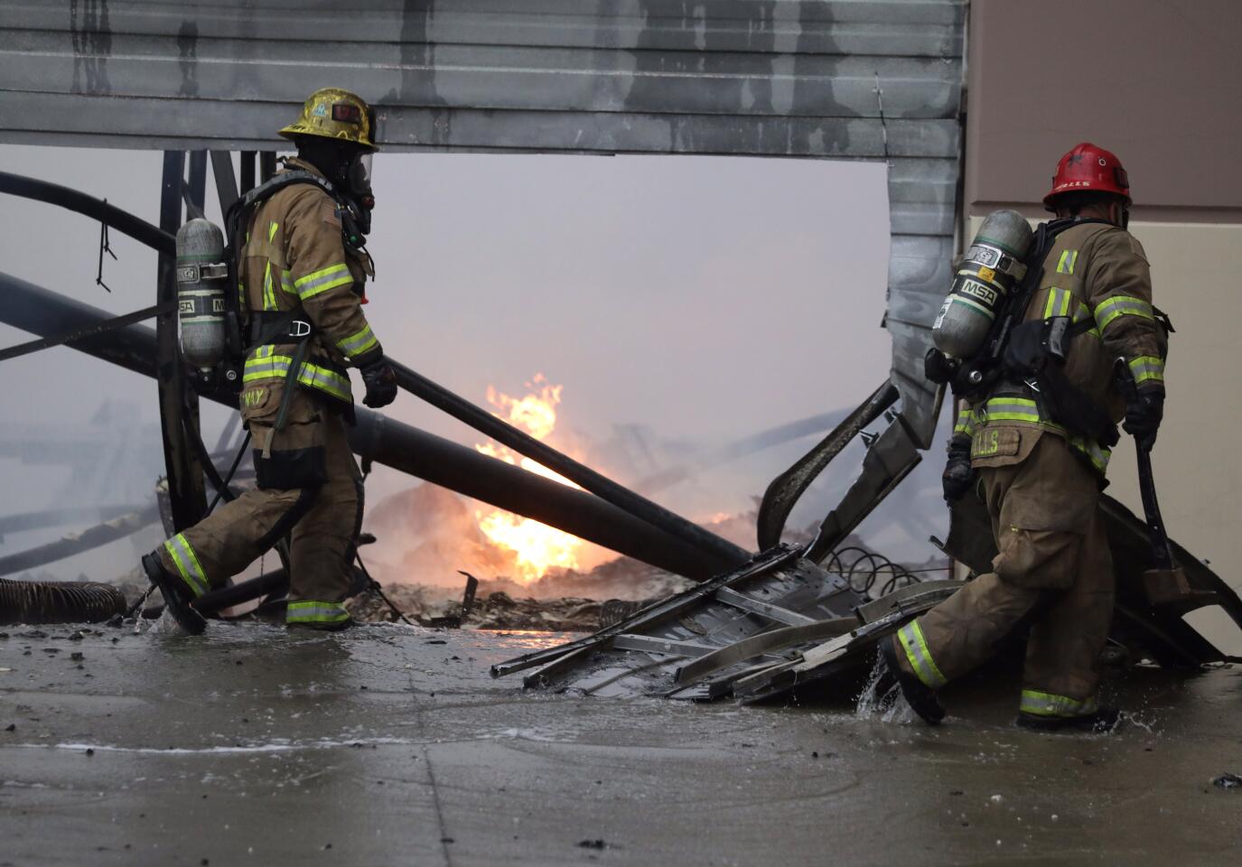 Firefighters battle warehouse fire in Redlands