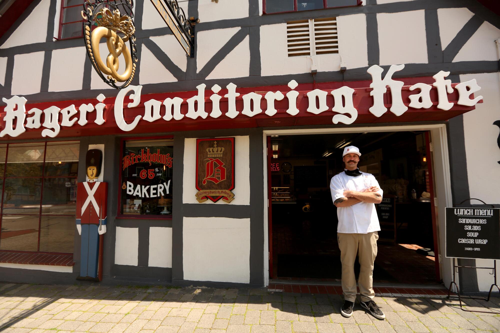 Thomas Birkholm, third generation owner of Birkholm's Bakery & Cafe, has one of the few businesses still open in downtown Solvang.