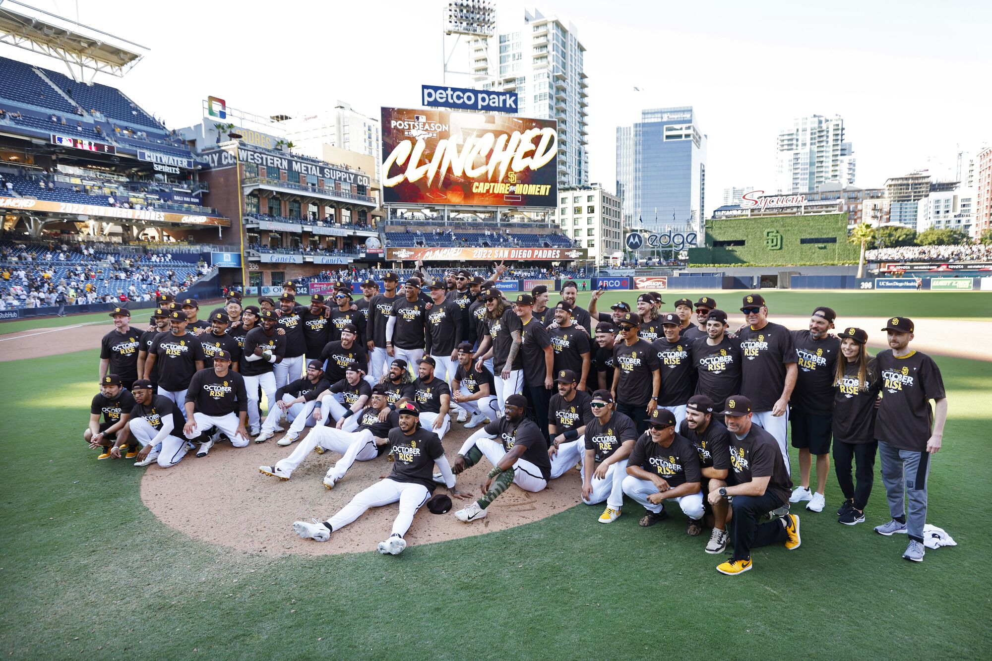 The Padres posed for a photo on the mound at Petco Park after the team clinched a wildcard playoff spot.