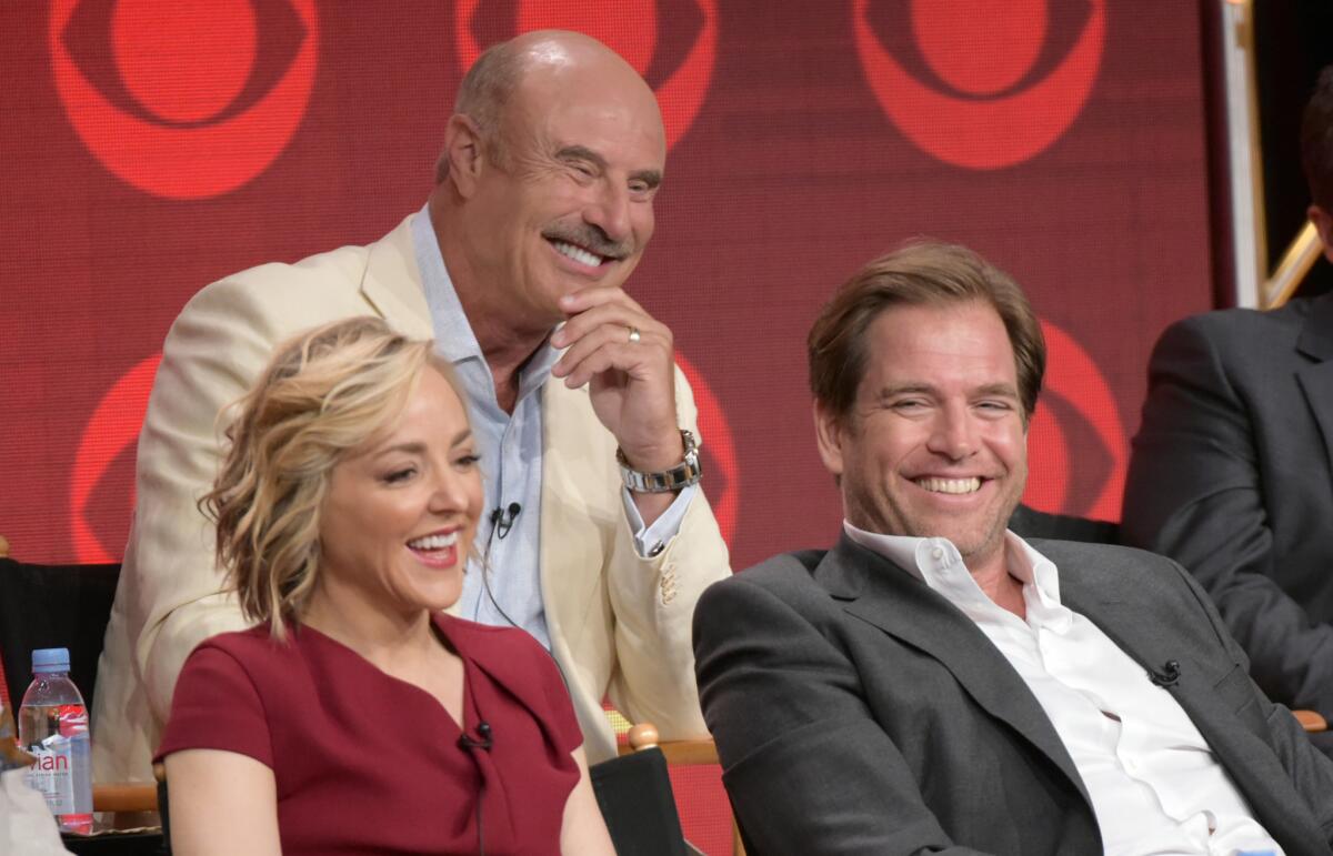 Phil "Dr. Phil" McGraw, center, with Geneva Carr and Michael Weatherly at the Television Critics Assn. press tour Aug. 10.