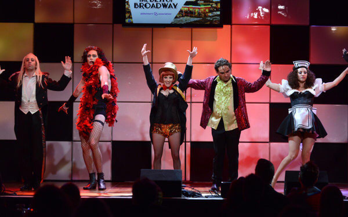 From left, actors Simon Helberg, Jim Parsons, Melissa Rauch, Johnny Galecki and Kaley Cuoco, from the cast of "The Big Bang Theory," perform onstage at the 21st annual "A Night at Sardi's" on Wednesday in Beverly Hills.