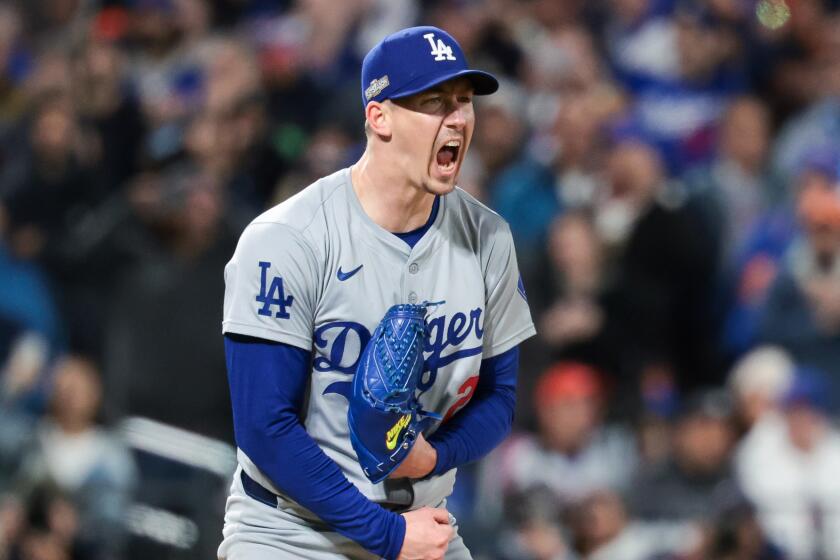 NEW YORK, NEW YORK - OCTOBER 16: Walker Buehler #21 of the Los Angeles Dodgers reacts.