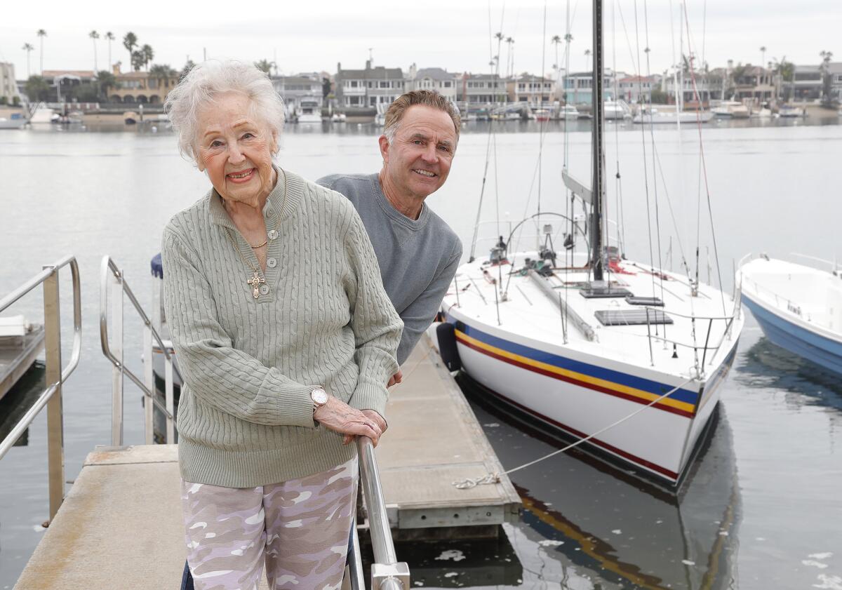 Ricki Richley and son Buddy will celebrate the 40th birthday of the racing sailboat Amante, docked at right.