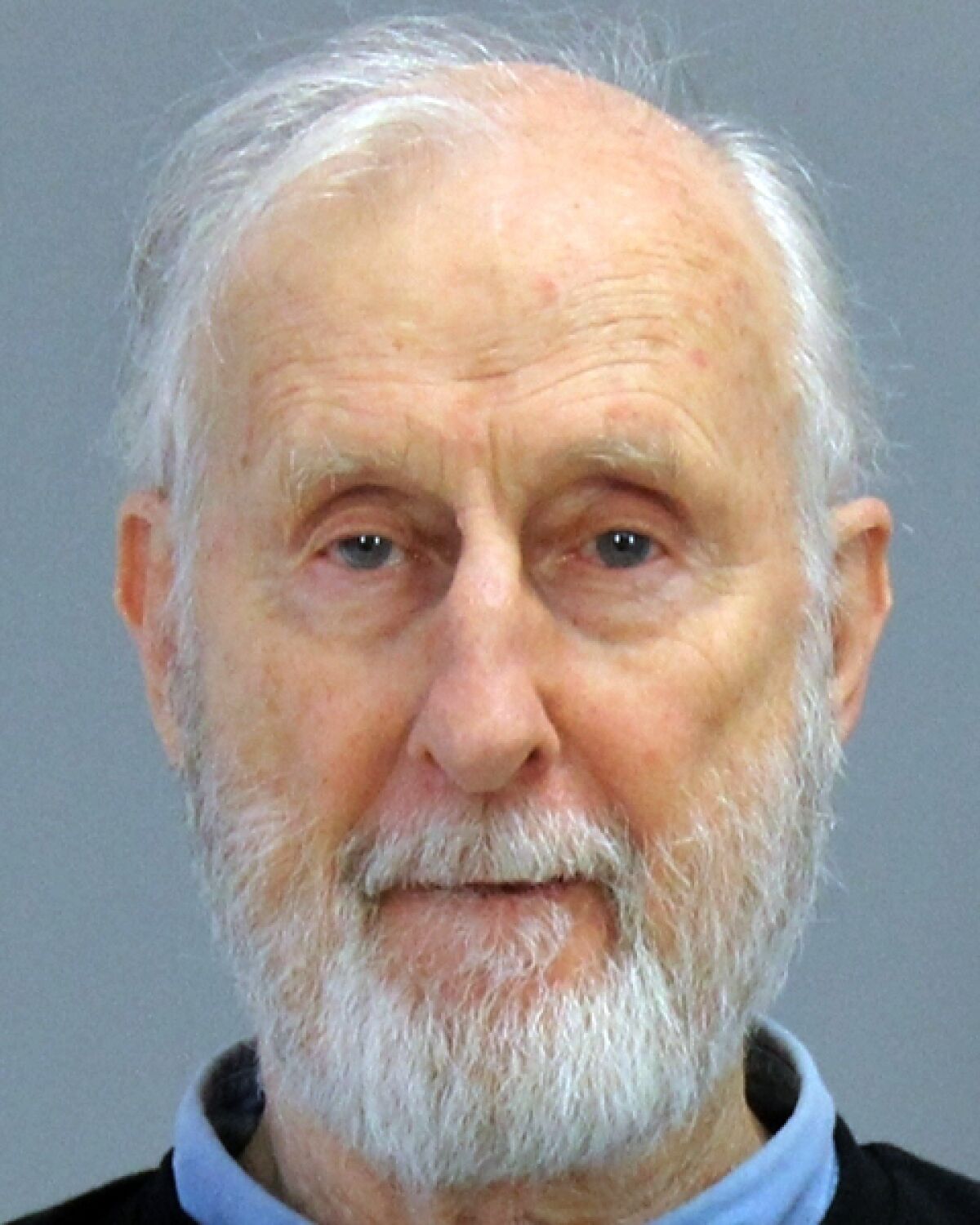 This Thursday, Oct. 31, 2019 photo provided by the Brazos County (Texas) Detention Center shows actor James Cromwell. Actor James Cromwell and Jeremy Beckham have been charged with disorderly conduct after police said they disrupted a meeting of the Texas A&M University System Board of Regents. (Brazos County (Texas) Detention Center via AP)