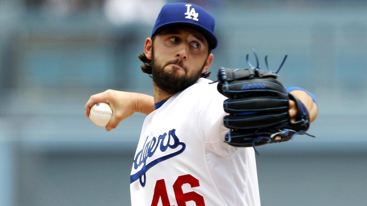 Dodgers starting pitcher Mike Bolsinger gave up three hits and two walks in his six innings against the Rockies on Sunday. He struck out six.
