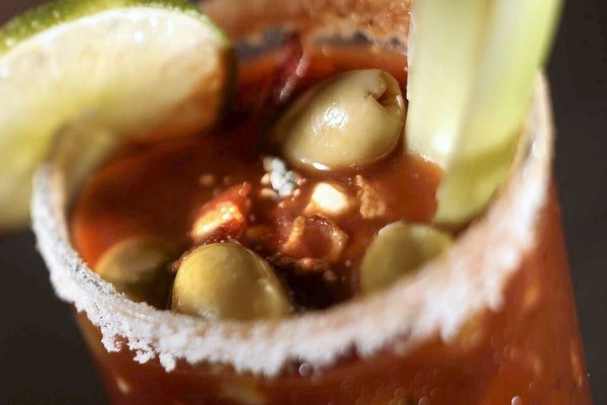 A great Bloody Mary begins with a good mix. Add-ins can include olives, celery and bacon.