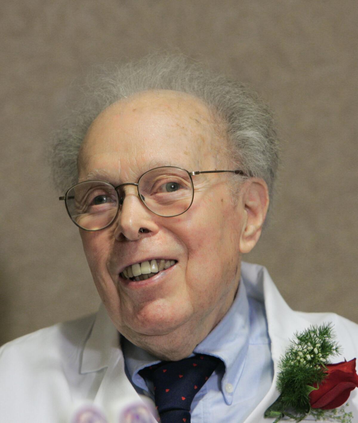 Dr. Denham Harman, pictured at his 90th birthday party in 2006, developed the most widely accepted theory on aging that's used to study cancer and other diseases.