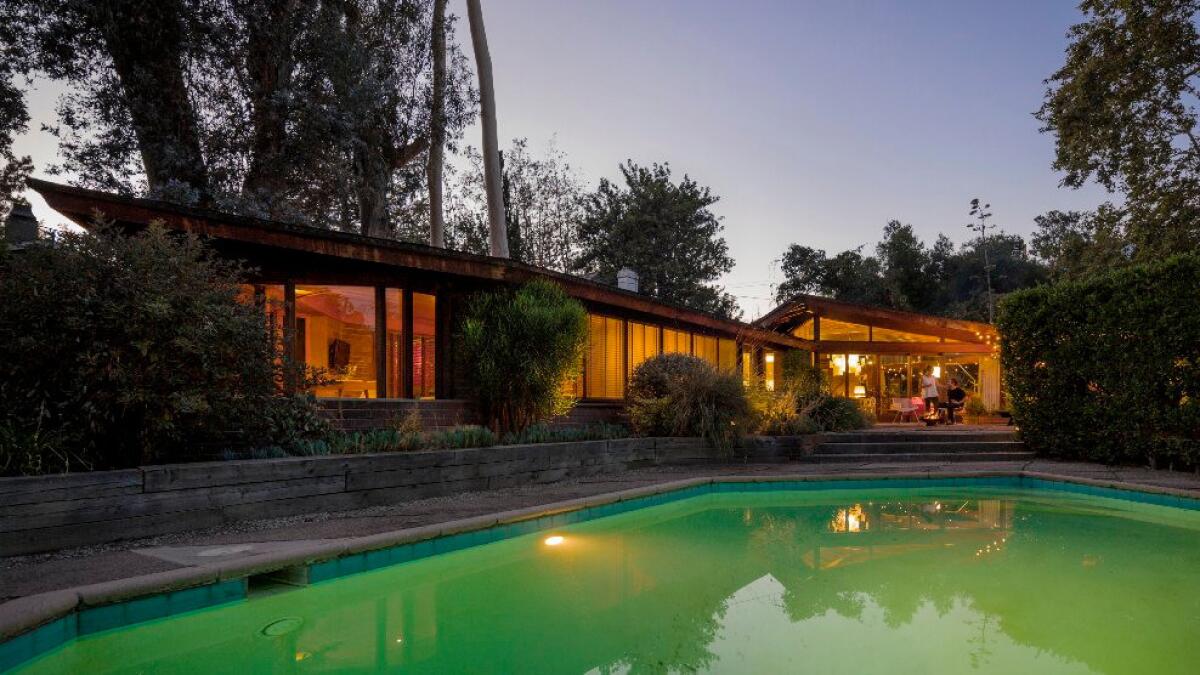 With its sawtooth roof, brick, glass and wood composition, Frank Lloyd Wright Jr.’s Dorland House in Altadena is reminiscent of his father's Usonian-style homes.