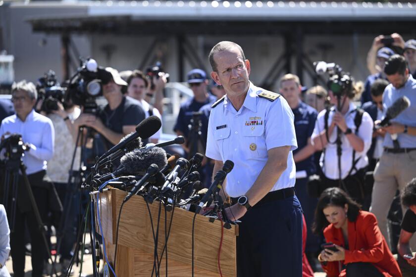 BOSTON, MA, UNITED STATES - JUNE 22: US Rear Adm. John Mauger, the First Coast Guard District commander, makes statements to the press at the US Coast Guard Base Boston in Boston, Massachusetts, United States on June 22, 2023. Debris discovered on the ocean floor suggests the missing submersible near the wreck of the Titanic suffered a "catastrophic loss" of pressure, Mauger said. (Photo by Fatih Aktas/Anadolu Agency via Getty Images)