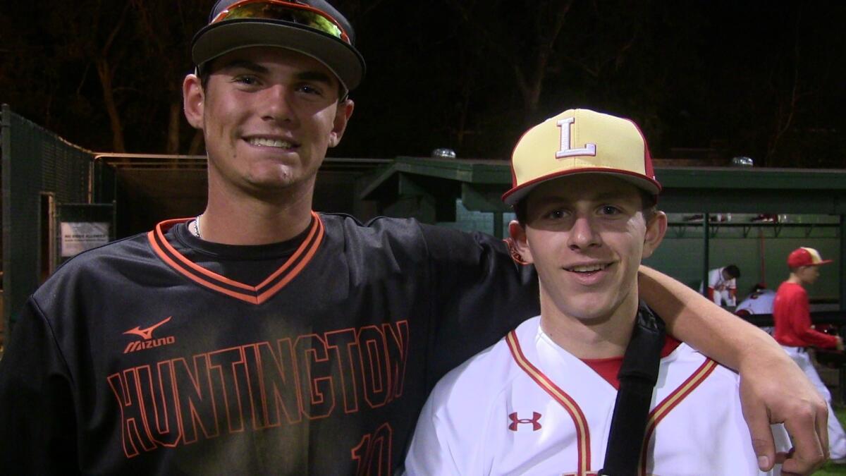 The two baseball players named Dylan Palmer meet. Dylan Palmer of Huntington Beach (left) and Dylan Palmer of Orange Lutheran.