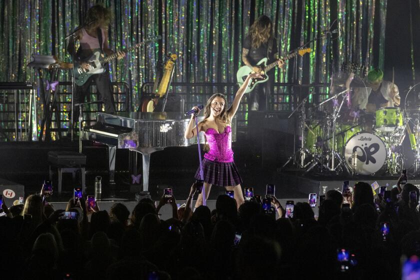 Los Angeles, CA - May 24: Olivia Rodrigo performs onstage at the Greek Theatre on Tuesday, May 24, 2022 in Los Angeles, CA. (Brian van der Brug / Los Angeles Times)