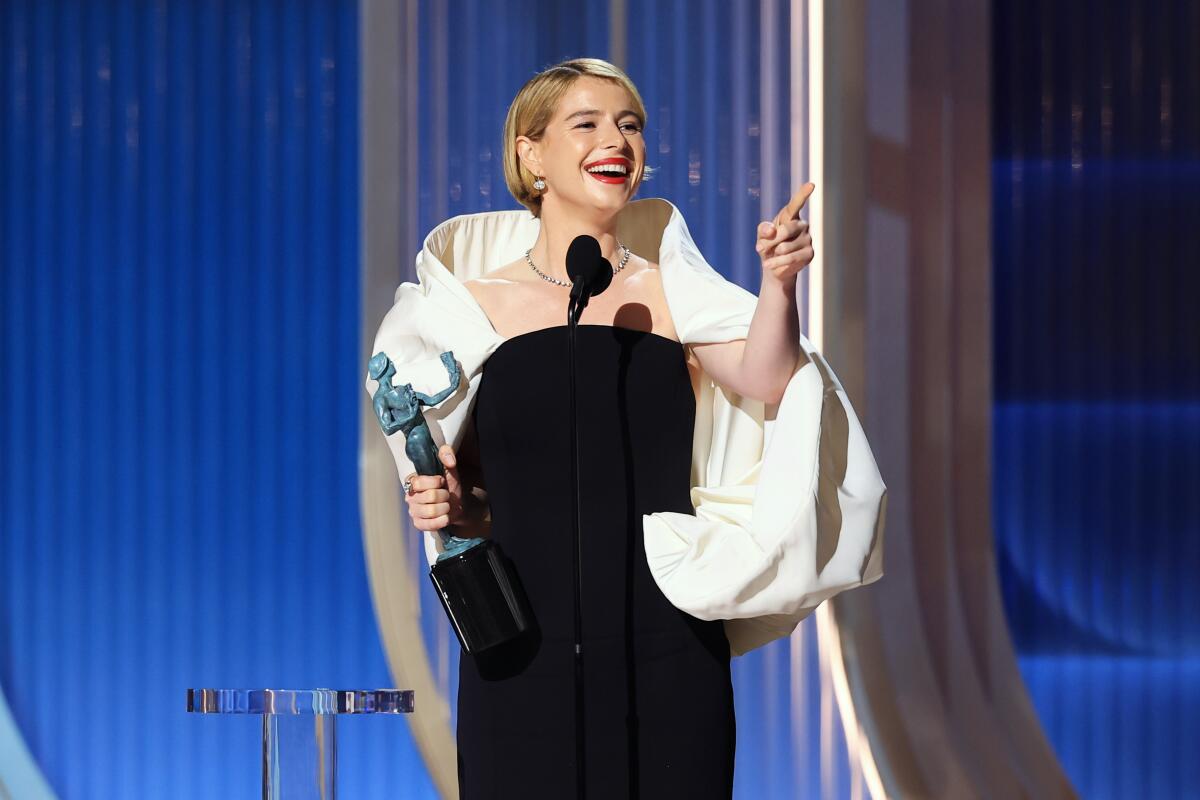 Jessie Buckley accepts the Actor Award for performance by a female actor in a leading role.