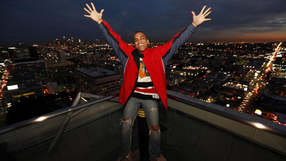 On top of the world: California-born singer-rapper Anderson .Paak atop the Koreatown building where his friend Jonathan Park, known in the music industry as Dumbfounded, lives.