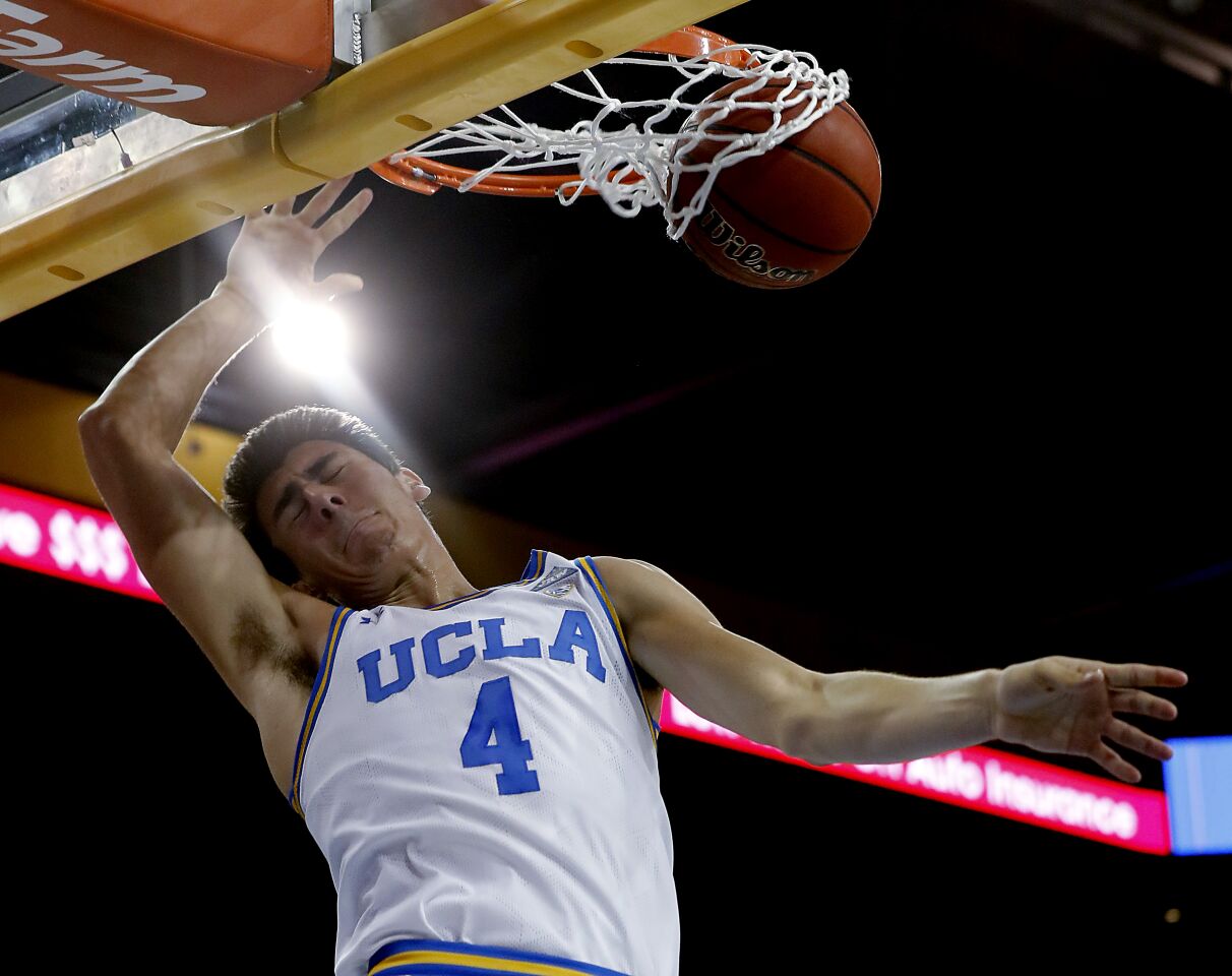 UCLA guard Jaime Jaquez Jr. throws down a dunk against San Jose State in the first half.