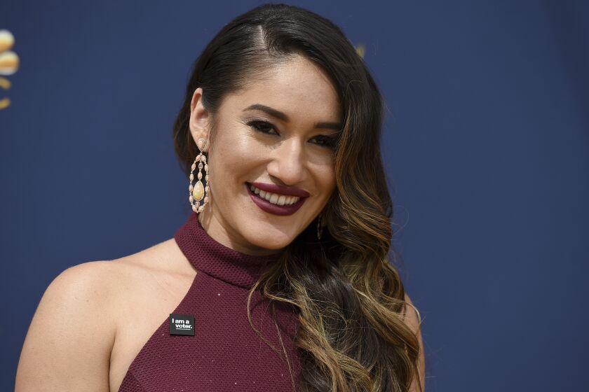 FILE - Q’orianka Kilcher arrives at the 70th Primetime Emmy Awards on Sept. 17, 2018, in Los Angeles. “Yellowstone" actor Kilcher has been charged with illegally collecting nearly $97,000 in disability benefits while working on the TV show, authorities announced, Monday, July 11, 2022. (Photo by Jordan Strauss/Invision/AP, File)
