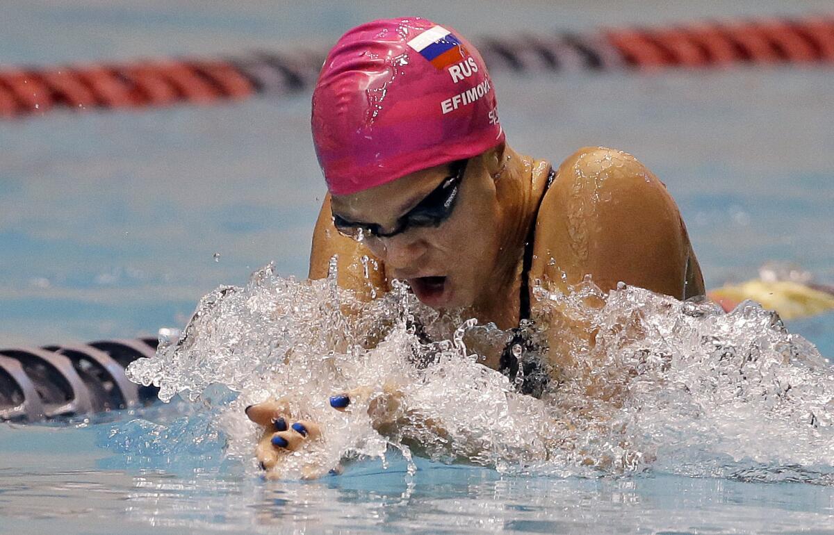 Russia's Yulia Efimova swims in the women's 100-meter breaststroke in Federal Way, Wash., on Dec. 4, 2015.