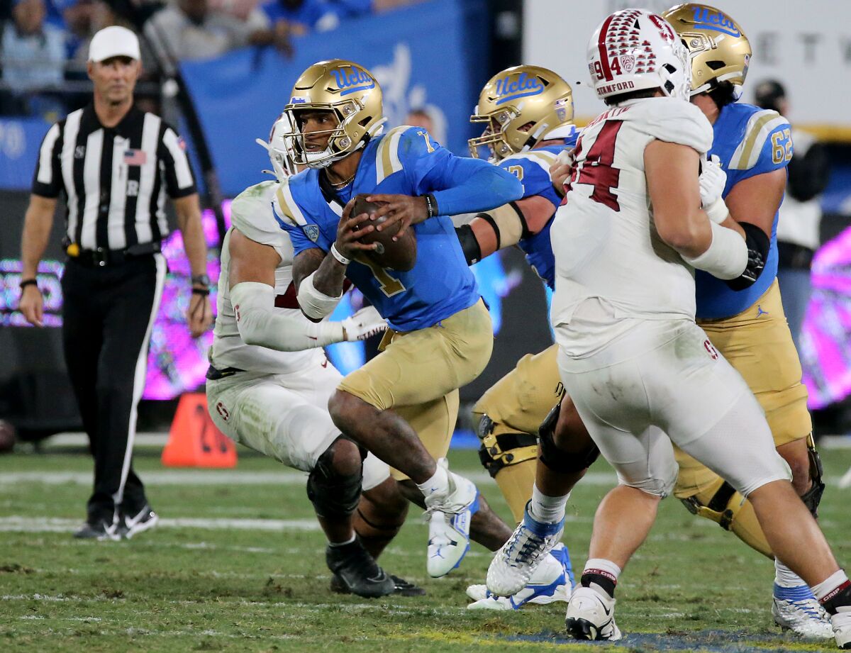 UCLA quarterback Dorian Thompson-Robinson scrambles for yards against Stanford in the second half.