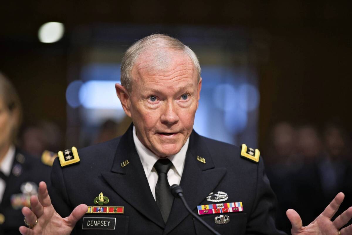 Army Gen. Martin Dempsey, chairman of the Joint Chiefs of Staff, testifies before the Senate Armed Services Committee during his reappointment hearing. Dempsey refused to offer his personal views on launching airstrikes in Syria to help the rebels, saying the president would make the final decision on use of force.