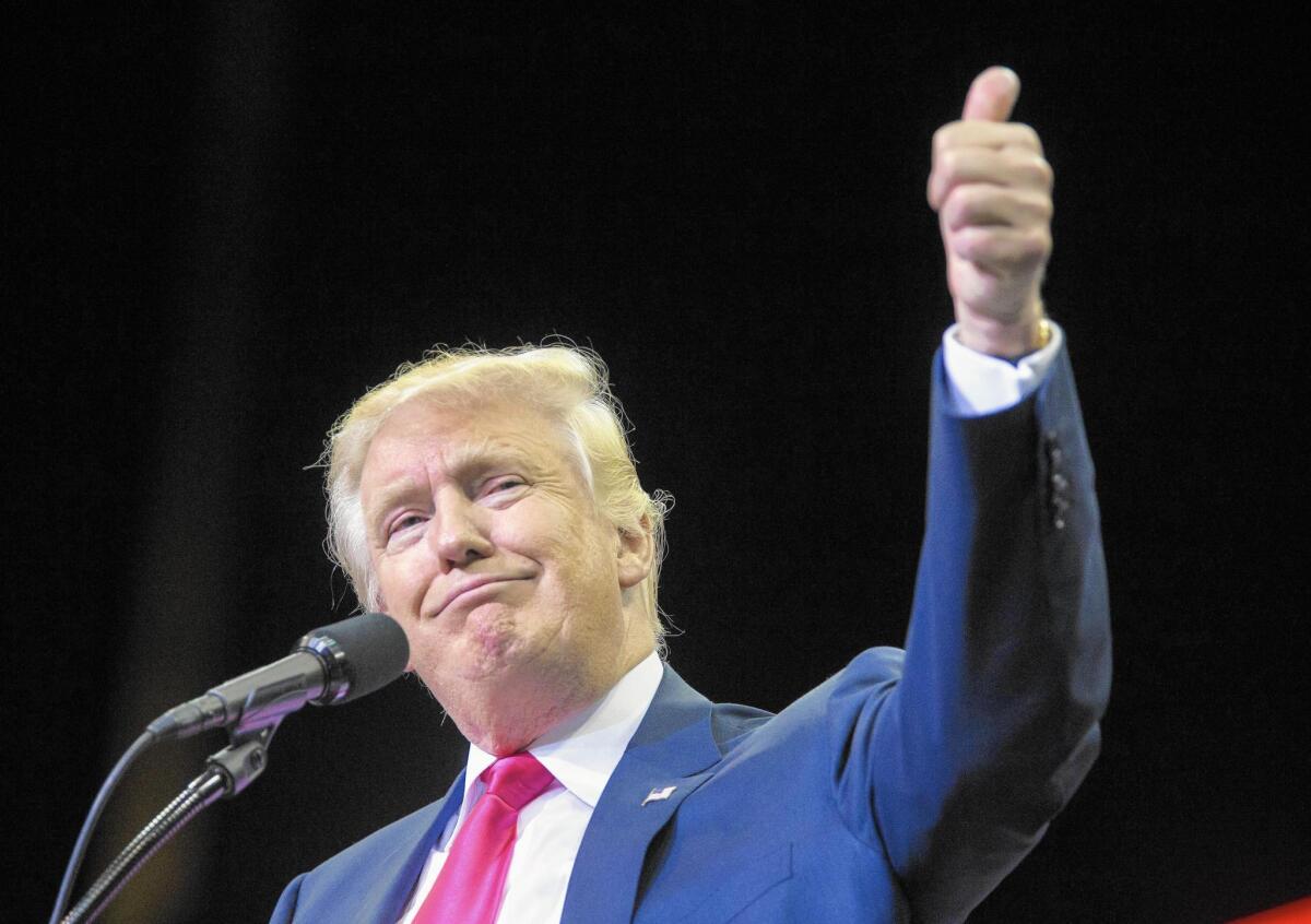 Republican presidential nominee Donald Trump gestures during a rally at Jacksonville Veterans Memorial Arena on Wednesday in Jacksonville, Fla.