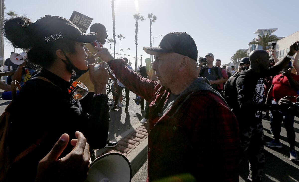 Tempers flare between Black Lives Matter demonstrators and Trump backers in O.C.