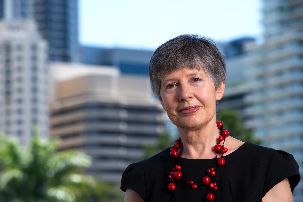 Lidia Morawska with buildings in the background.