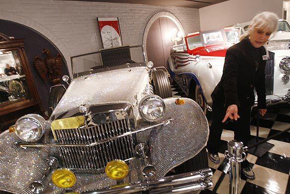 Lynn Musselman, a tour guide at the Liberace Museum off the Strip, points out details in LIberace's rhinestone-studded Rolls-Royce.