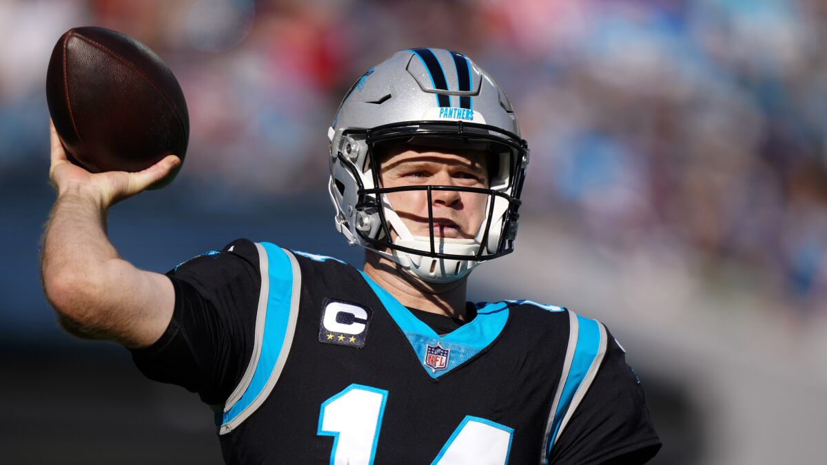 Carolina Panthers quarterback Sam Darnold passes during the first half of an NFL football game against the New England Patriots Sunday, Nov. 7, 2021, in Charlotte, N.C. The Panthers’ quarterback situation took another turn on Wednesday, Dec. 15, 2021 as Darnold was back at practice earlier than expected after being designated to return from injured reserve. (AP Photo/Jacob Kupferman)