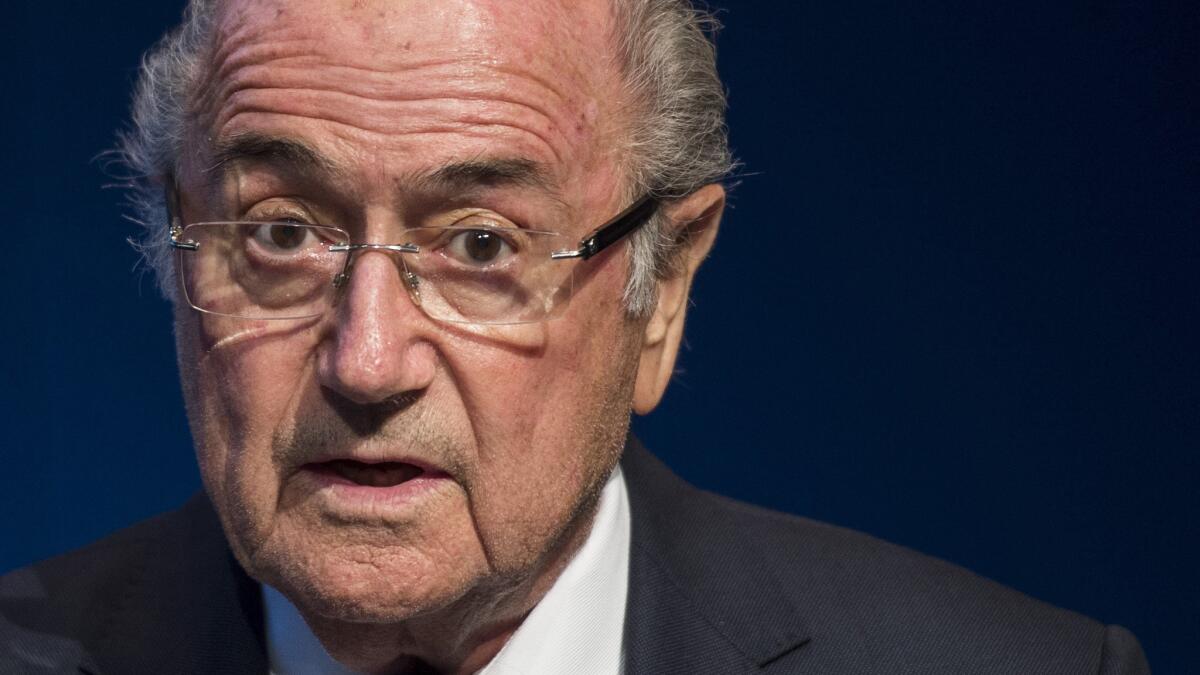 FIFA President Sepp Blatter speaks during a press conference at the FIFA headquarters in Zurich, Switzerland, Tuesday, June 2, 2015. Sepp Blatter says he will resign from his position amid corruption scandal and is promising to call for fresh elections to choose a successor. (Ennio Leanza/Keystone via AP)