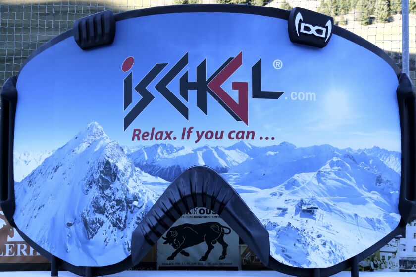 FILE - A giant advertising goggle reading the slogan 'relax, if you can' stands in Ischgl, Austria, Thursday, Nov. 26, 2020. An Austrian federal court says the state can’t be held liable for a COVID-19 infection in an outbreak at an Alpine ski resort as the pandemic hit Europe in early 2020. The Supreme Court of Justice on Thursday announced its verdict in a long-running legal battle involving a German resident who traveled to Ischgl on March 7, 2020 and visited several apres-ski venues before returning home six days later. (AP Photo/Matthias Schrader, File)