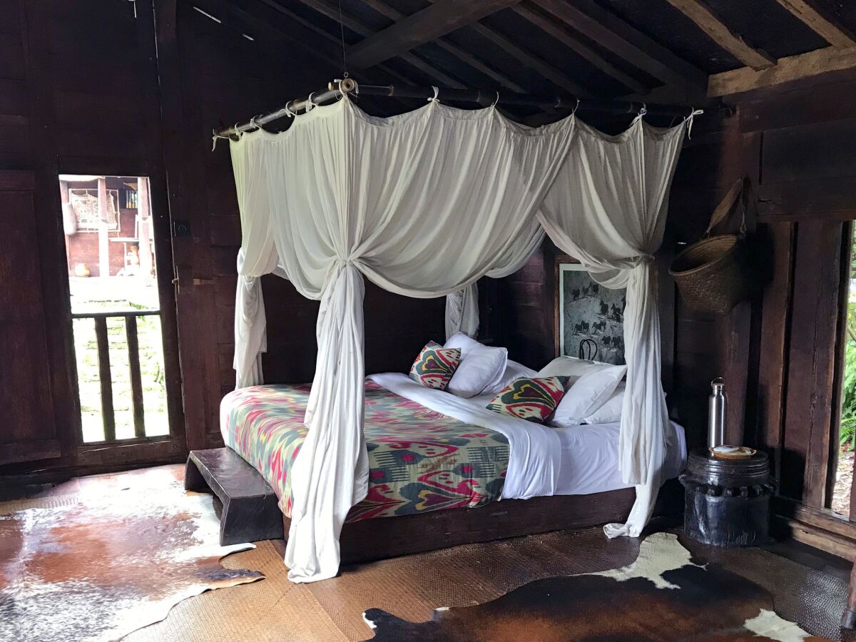 Inside Afrika House, a 150-year old bridal cottage transported from the island of Java by John and Cynthia Hardy, who own Bambu Indah, an eco-resort in Ubud.
