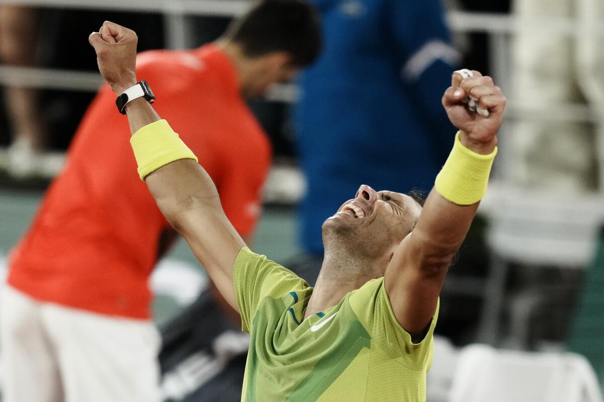 Spain's Rafael Nadal reacts after defeating Serbia's Novak Djokovic in their quarterfinal match of the French Open tennis tournament at the Roland Garros stadium Tuesday, May 31, 2022 in Paris. Nadal won 6-2, 4-6, 6-2, 7-6. (AP Photo/Thibault Camus)