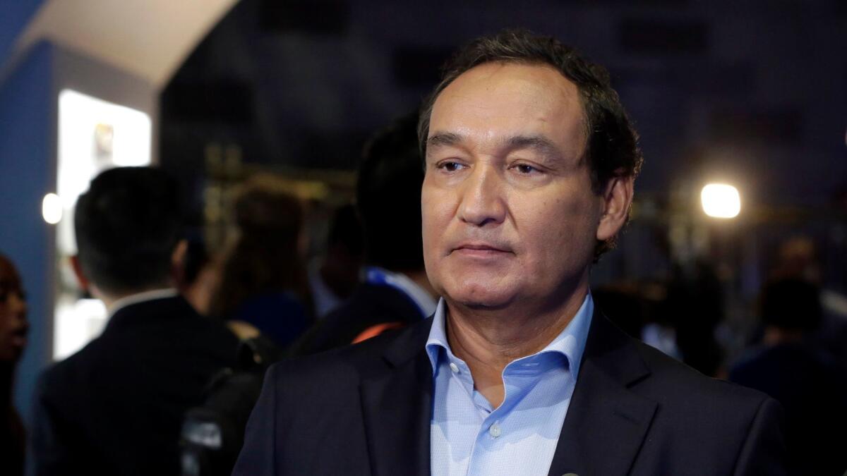 United Continental Holdings chief executive Oscar Munoz won't take the position of chairman of the board next year, as he was scheduled to under a previous employment agreement. The move comes amid furor over the forced removal of a passenger from an April 9 flight.