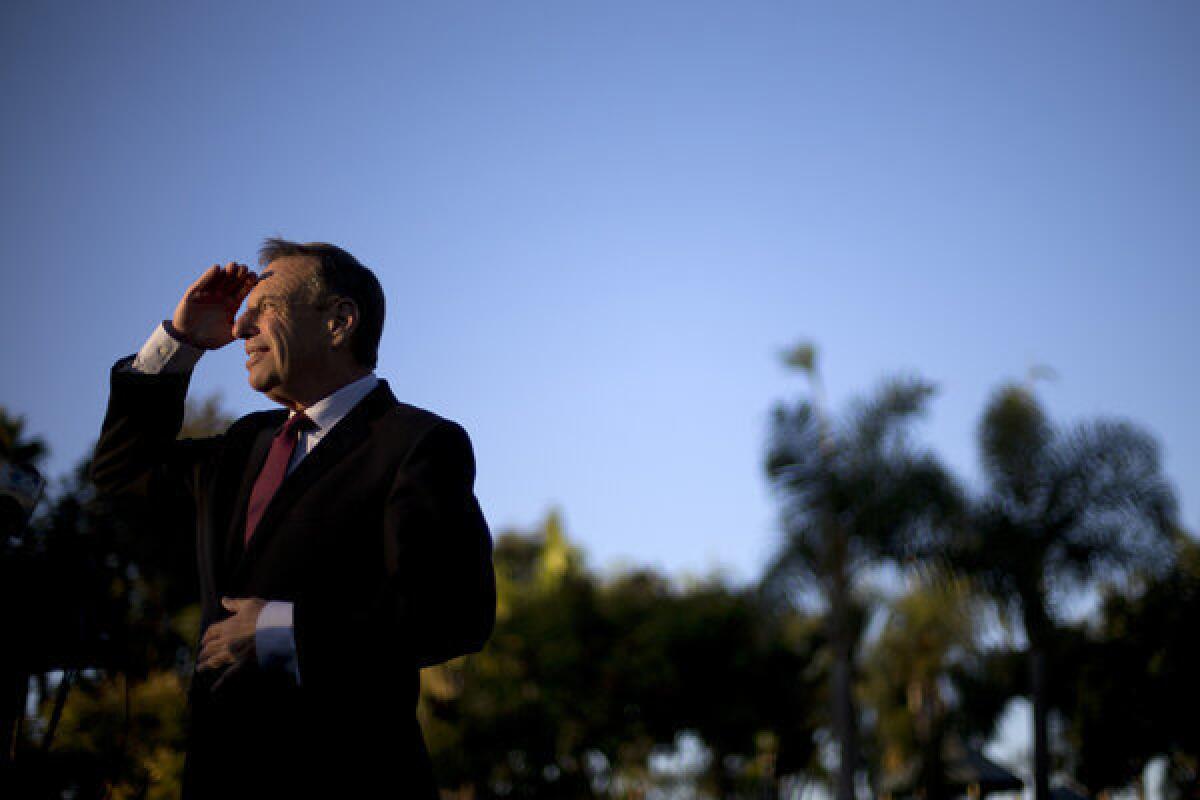 Former Congressman Bob Filner, now San Diego mayor, looks into the sun during a 2012 news conference in the city.