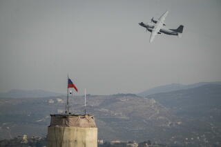 A Russian aircraft takes off at the Hmeimim Airbase in Syria.
