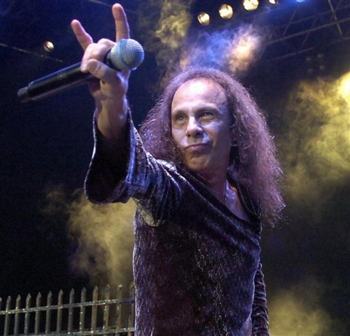 FILE - In this July 7, 2007 file photo, Ronnie James Dio performs with British heavy metal group Heaven and Hell during the 41st annual Montreux Jazz Festival in Switzerland. Dio, who replaced Ozzy Osbourne in Black Sabbath and later led the band Dio, died Sunday, May 16, 2010. He was 67. (AP Photo/Keystone, Sandro Campardo, File)