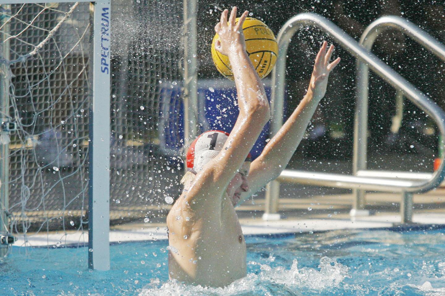 CV's Robert Menke blocks a shot during a match against Pasadena Poly at Pasadena Poly on Tuesday, September 25. 2012.