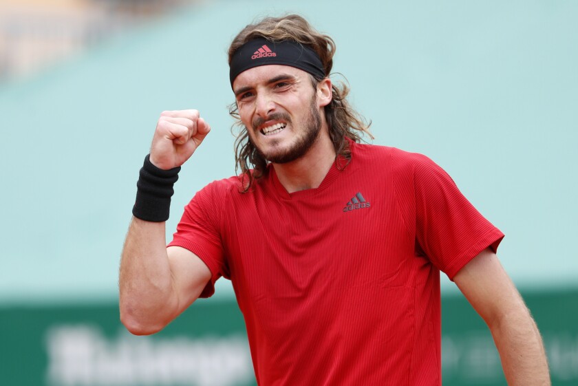 Stefanos Tsitsipas of Greece celebrates after defeating Daniel Evans of Britain in their semifinal match of the Monte Carlo Tennis Masters tournament in Monaco, Saturday, April 17, 2021. (AP Photo/Jean-Francois Badias)