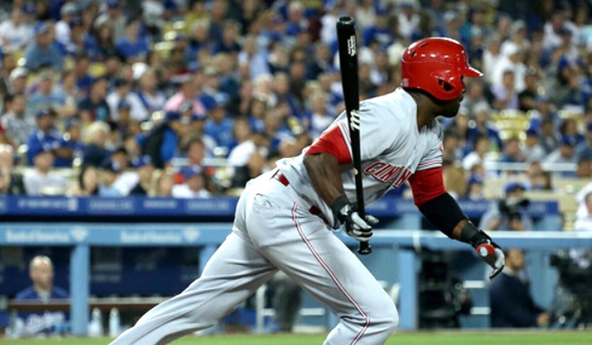 Roger Bernadina gets a run-scoring hit against the Dodgers while playing for the Cincinnati Reds earlier this season.
