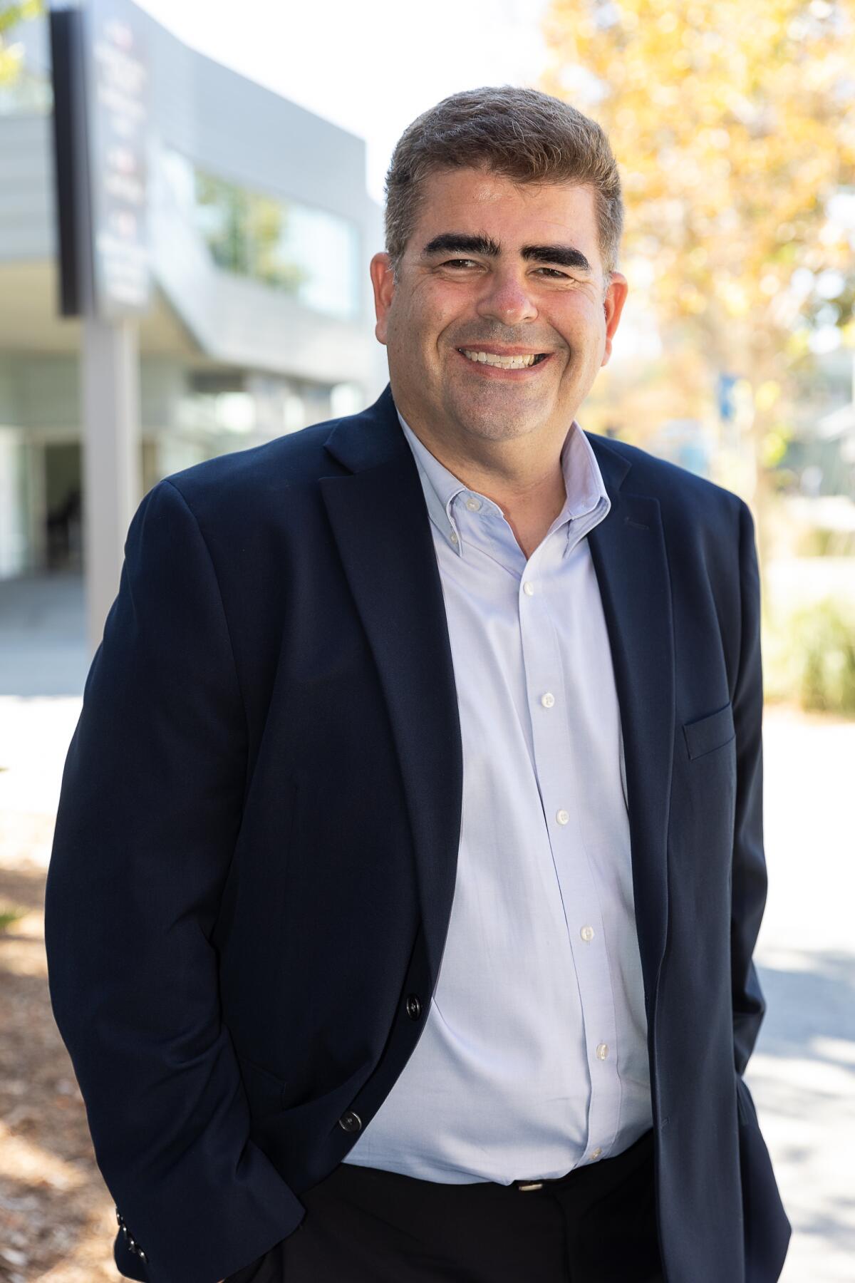 Gabriel Buelna, 50, is vying to keep his seat on the Los Angeles Community College District Board of Trustees.