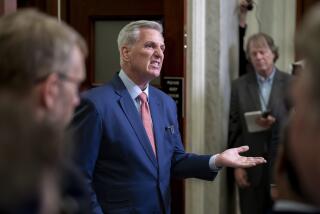 FILE - Speaker of the House Kevin McCarthy, R-Calif., talks to reporters outside his office about calls for an impeachment inquiry of President Joe Biden, at the Capitol in Washington, July 25, 2023. Congressional leaders are pitching a stopgap government funding package to avoid a federal shutdown after next month. McCarthy raised the idea to House Republicans on a members-only call. On Tuesday, Senate Majority Leader Chuck Schumer said the two leaders had spoken about such a temporary measure. (AP Photo/J. Scott Applewhite)