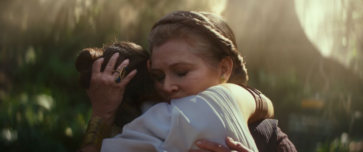 Daisy Ridley, left, and Carrie Fisher in "Star Wars: The Rise of Skywalker."