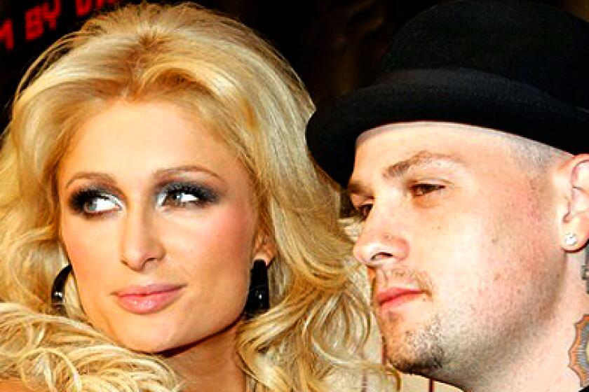Paris Hilton and Good Charlotte guitarist Benji Madden recently arrived at a special screening of the Lionsgate film, "Repo! The Genetic Opera," still looking like quite the couple.
