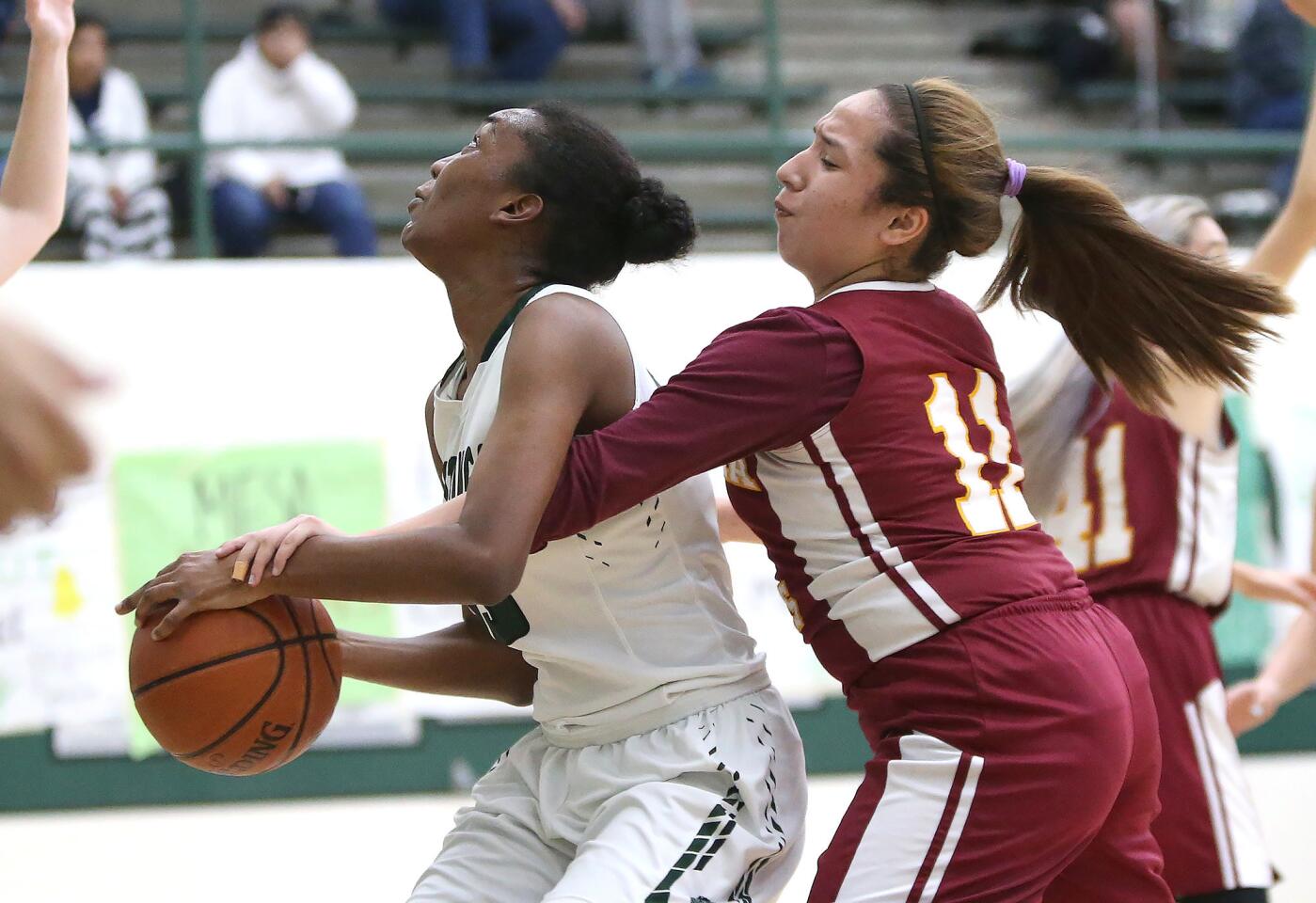 Photo Gallery: Estancia vs. Costa Mesa in girls’ basketball