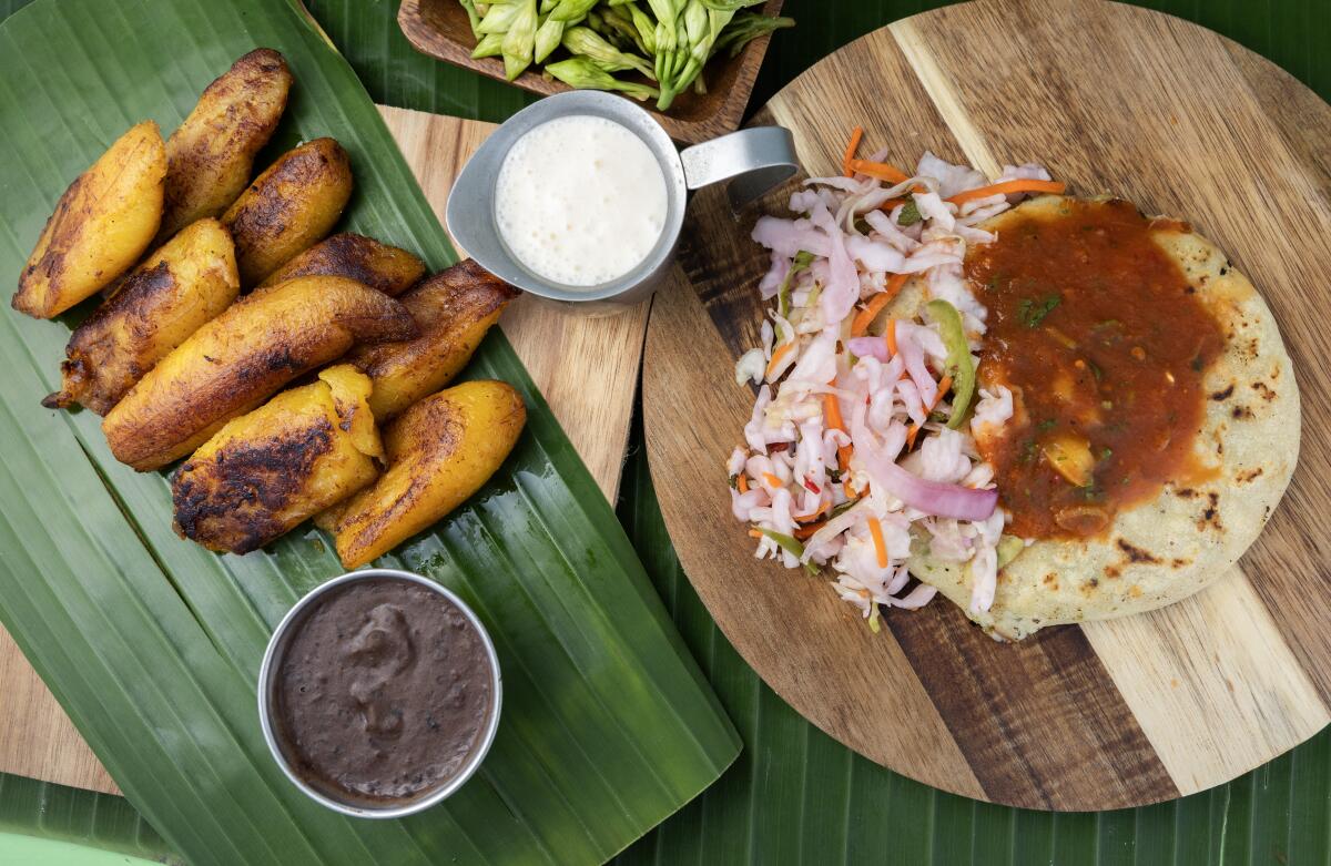 Fried plantains and a queso and loroco pupusa at Delmy’s Pupusas, a farmers market pop-up.