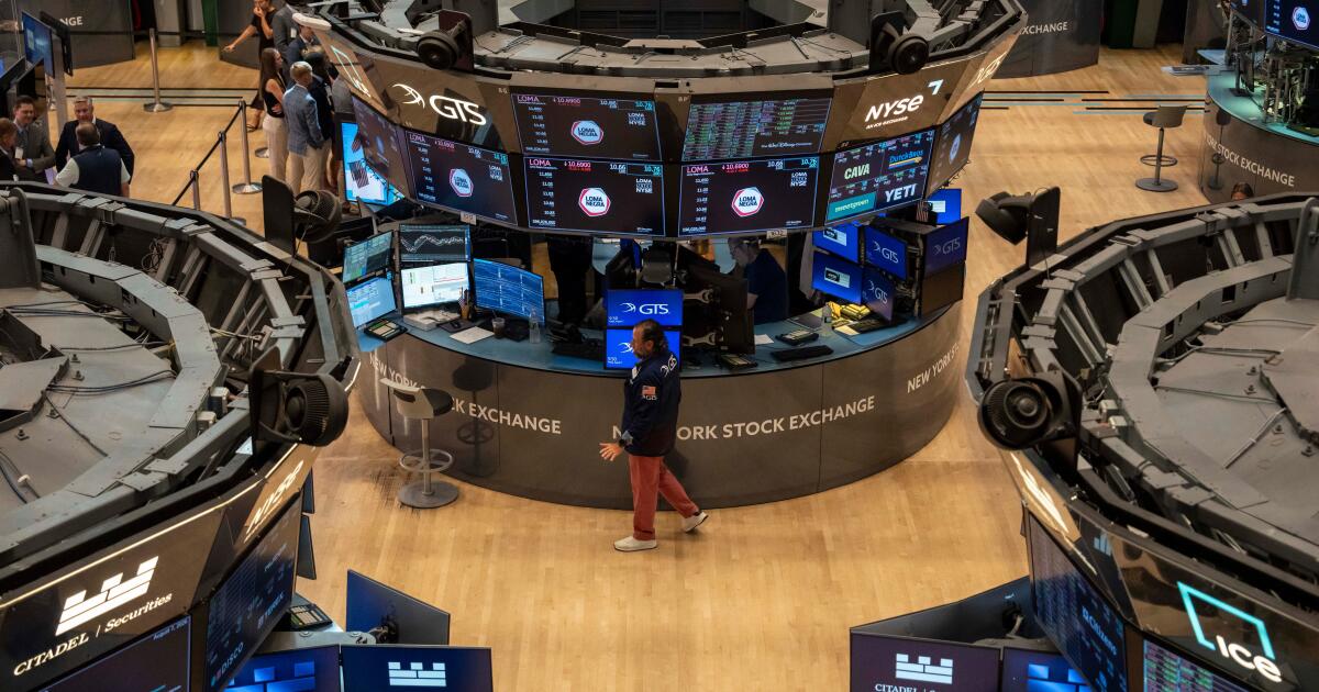 US stocks hit record high as inflation cools