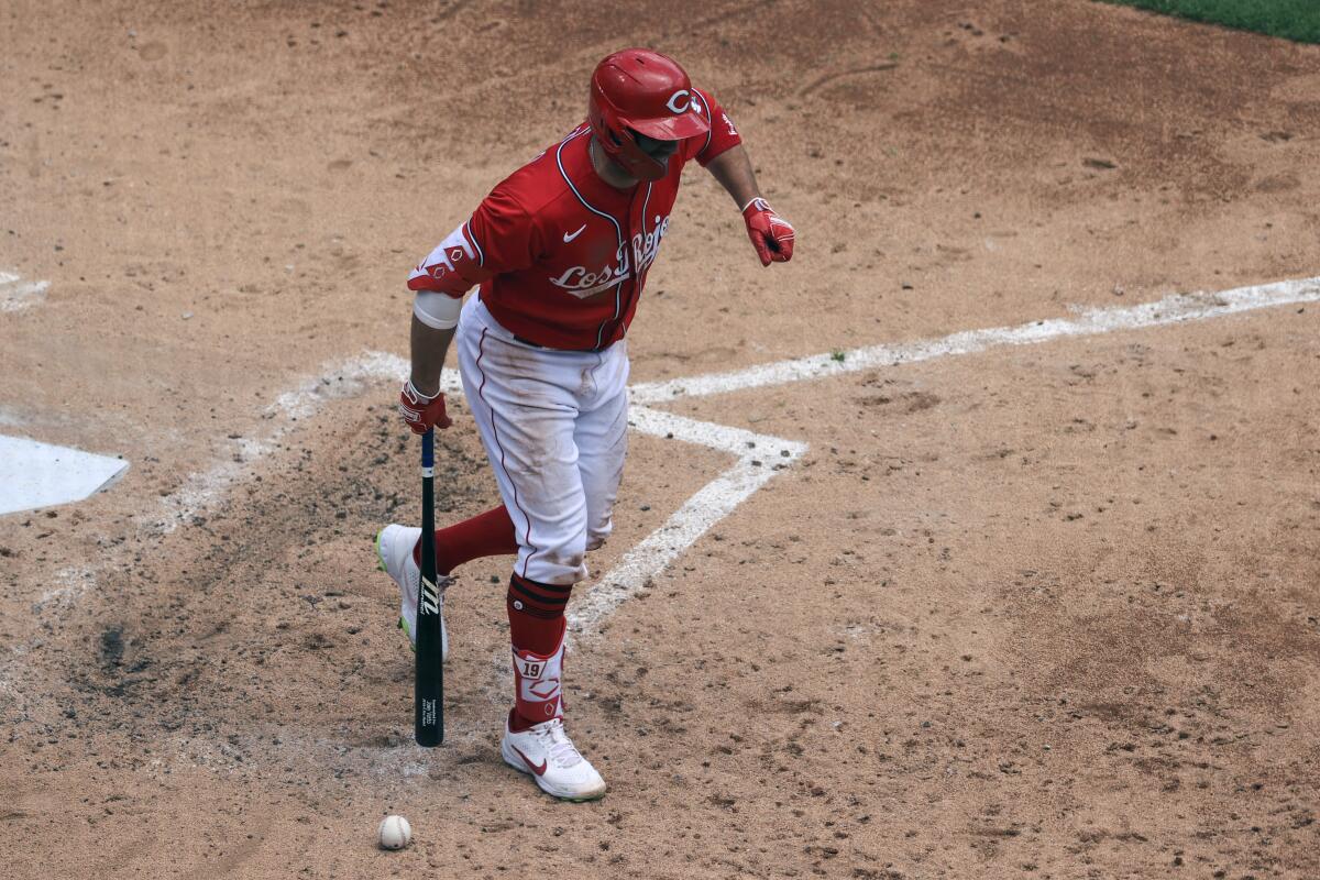 Cincinnati Reds' Joey Votto reacts after being hit by a pitch during the fourth inning of a baseball game against the Chicago White Sox in Cincinnati, Wednesday, May 5, 2021. (AP Photo/Aaron Doster)