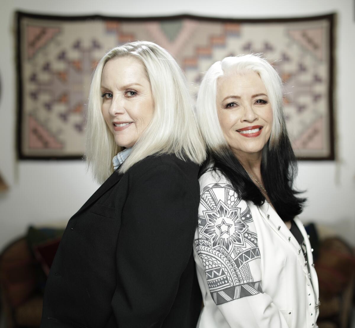 Cherie Currie, left, formerly of the Runaways, and Brie Darling of Fanny have teamed up for a new album.