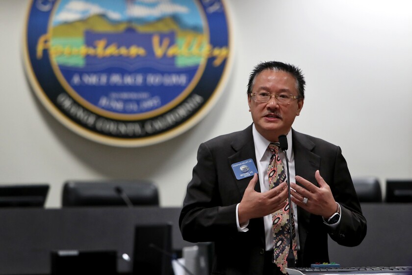 Fountain Valley Mayor Michael Vo speaks during a news conference on Friday for a community event called "Walk for Vietnam."
